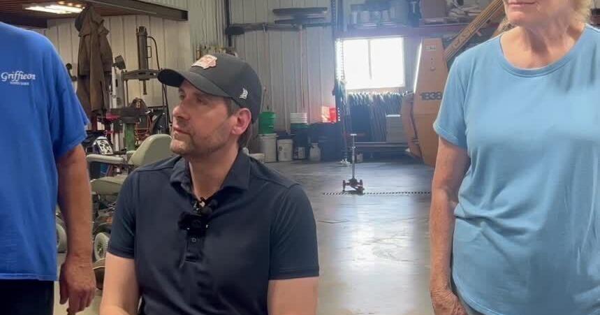 U.S. Senate candidate Josh Turek speaks during farm visit
