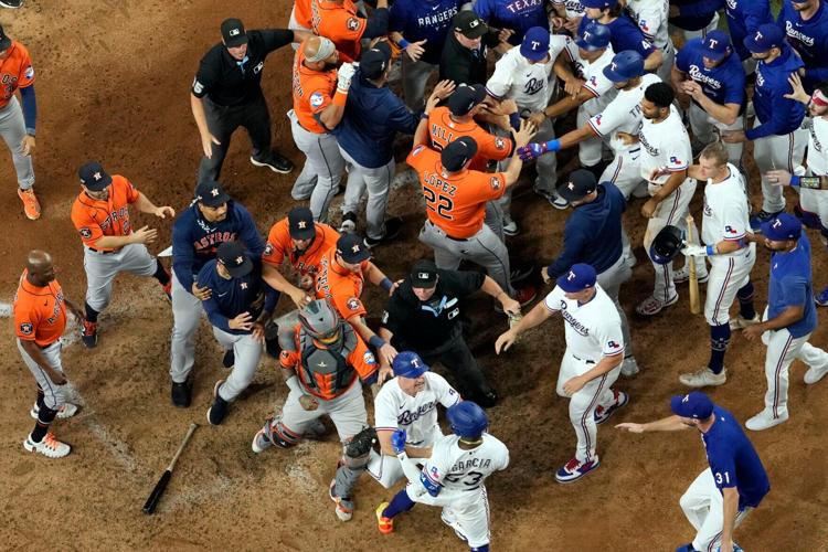 Rangers blank defending champion Astros in MLB playoffs