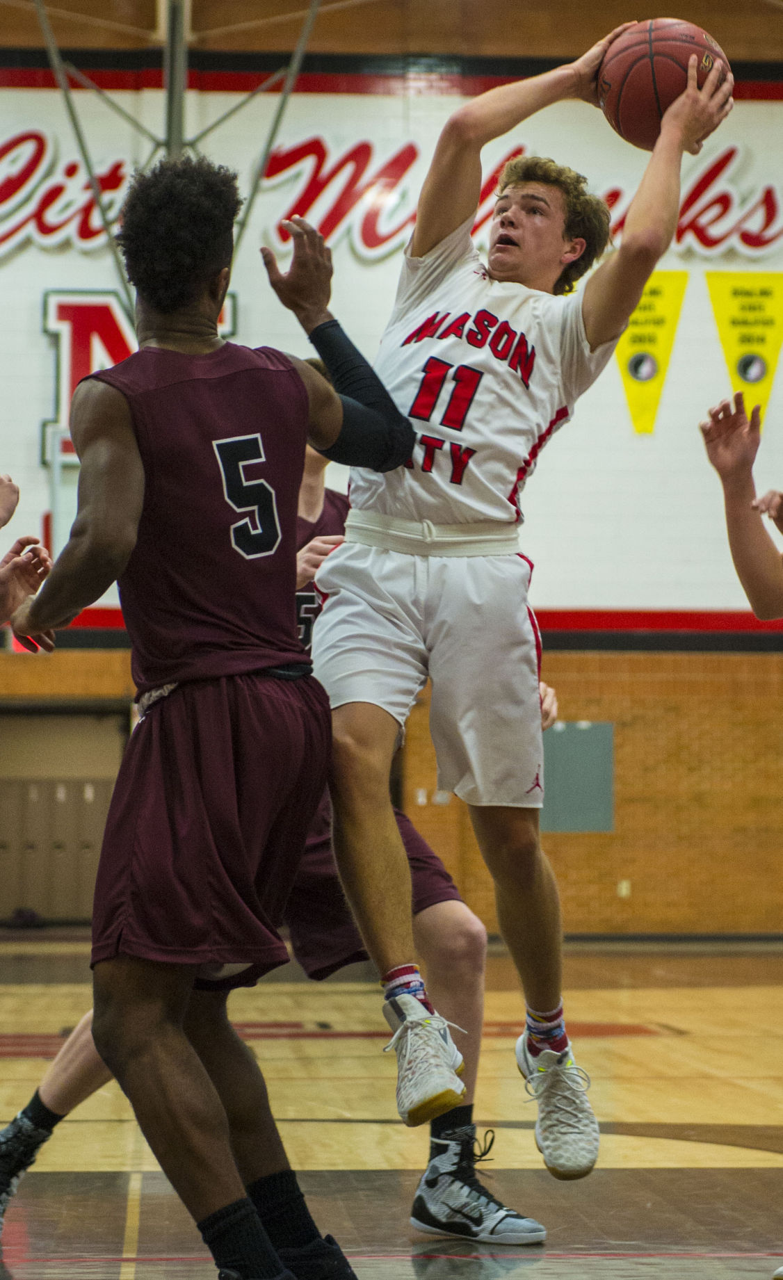 A MASTERFUL MOHAWK: Mason City's Lang shoots way to Globe Gazette ...