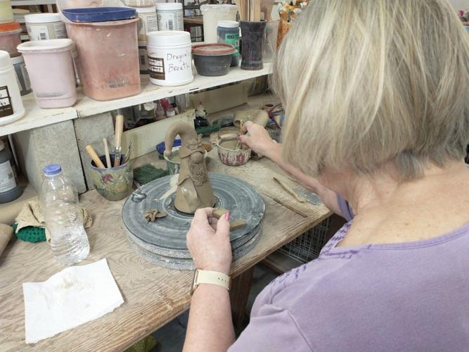Blue House Pottery is shown being made in Hanlontown..jpg