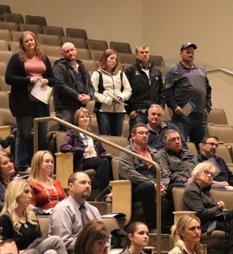 Kingland Construction employees stand to be recognized for their efforts in building the new career center..JPG