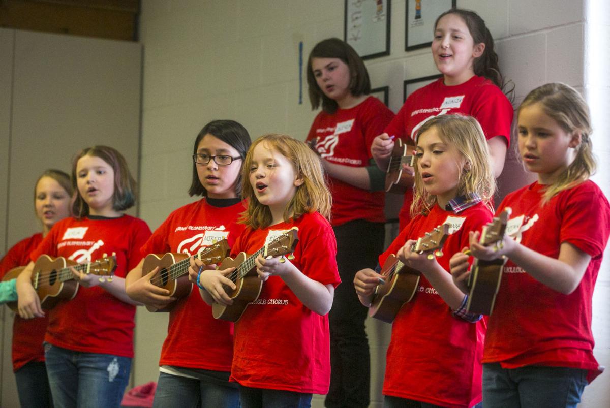 Ukulele Orchestra of Great Britain visits Mason City elementary school