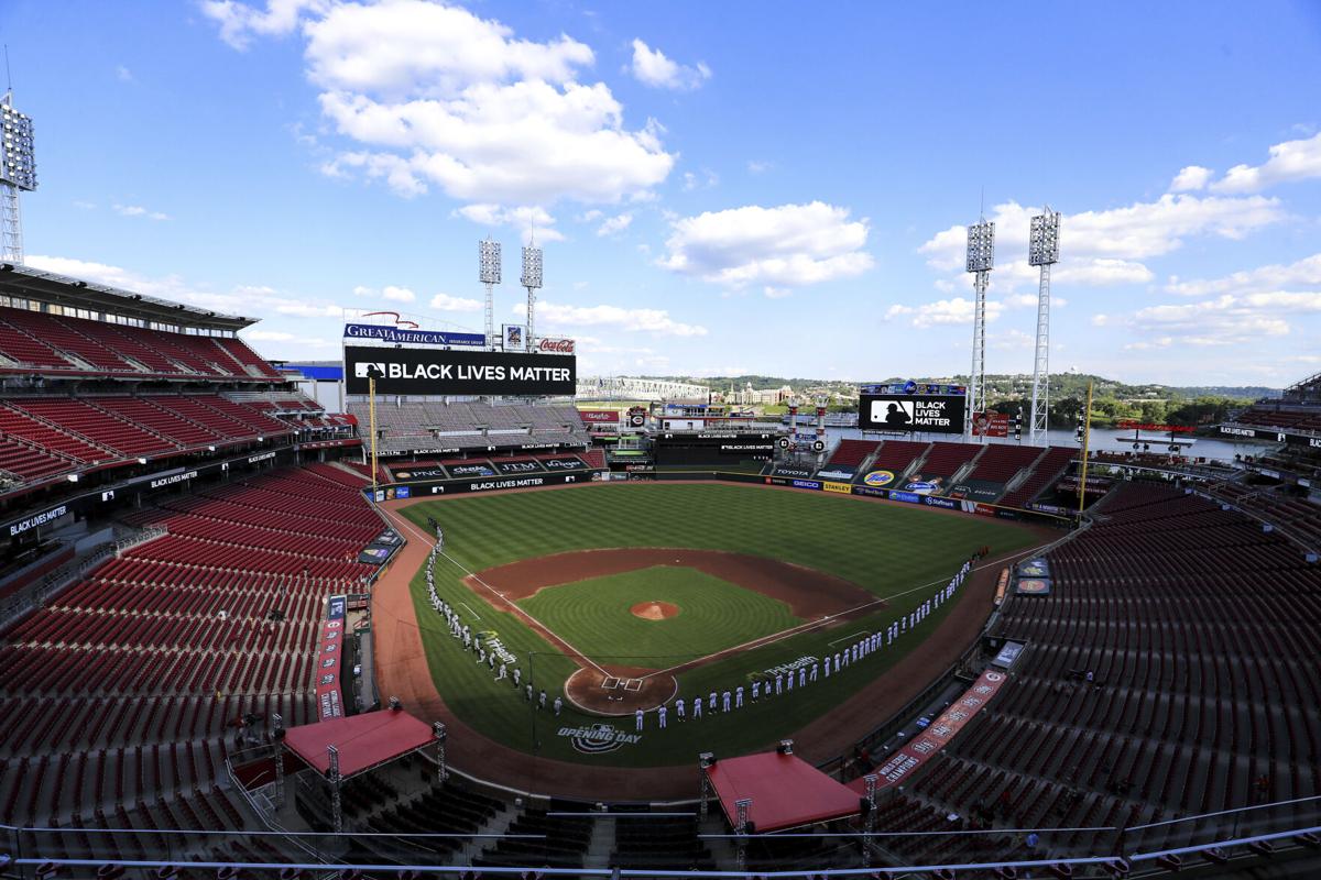 Empty stands, masked players as baseball returns