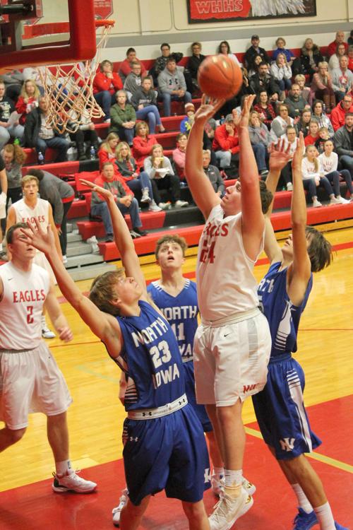 West Hancock Boys Basketball Falls To Lake Mills Community