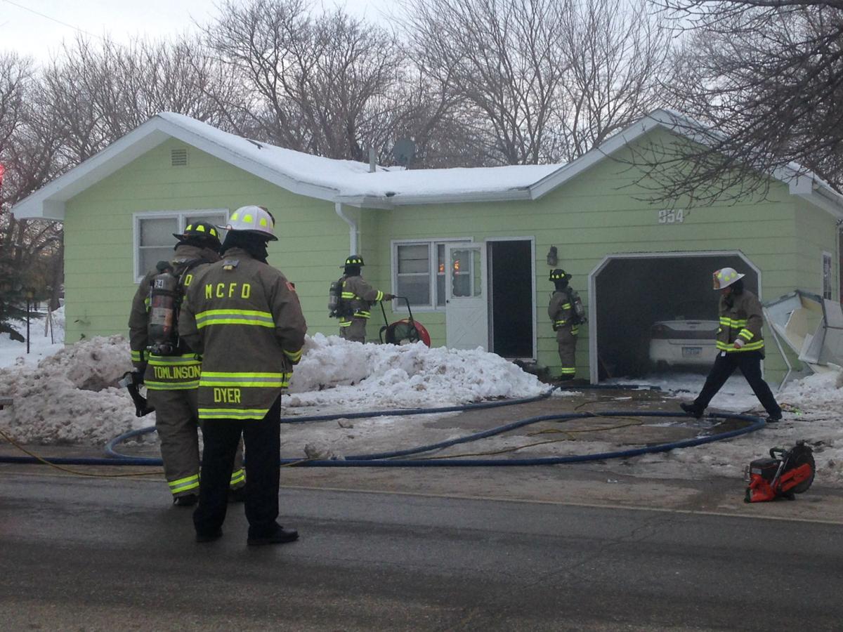 Car starts on fire inside Mason City garage