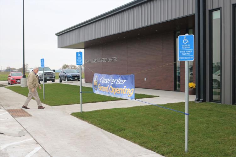 A guest arrives at the grand opening of the new John V. Hanson Career Center in Forest City..JPG