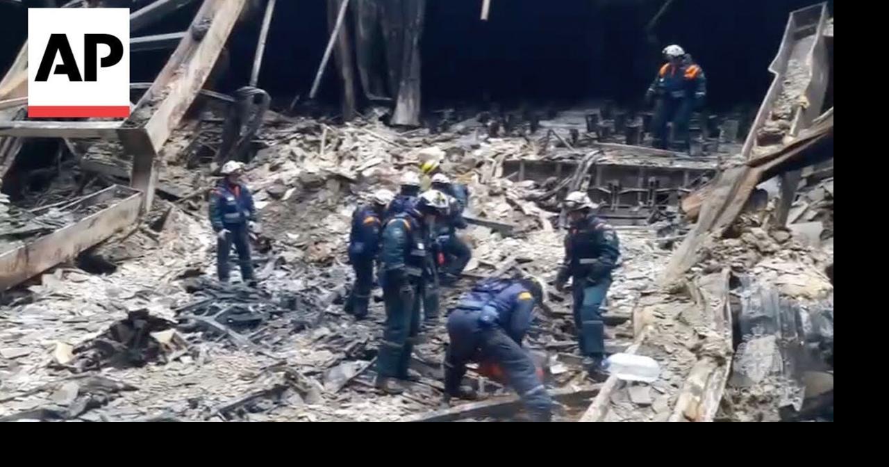 Rescuers clear rubble after Moscow attack while mourners bring flowers for victims->回答 2 件