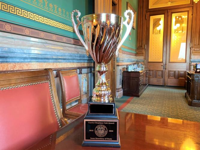The Carrie Chapman Catt Award Trophy is shown..jpg
