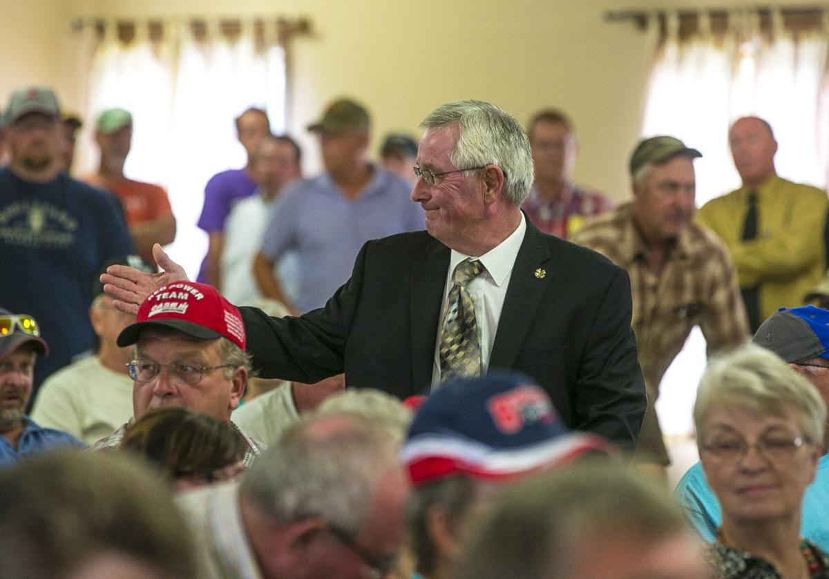 North Iowa auction draws serious buyers as well as curious onlookers