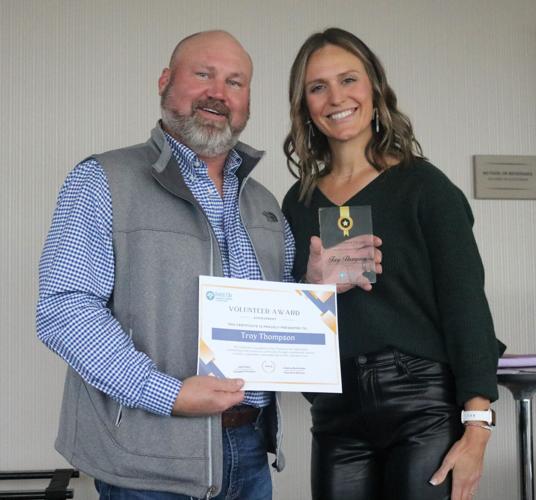 Troy Thompson of Forest City was named Volunteer of the Year on Oct. 11. He is shown with Chamber Executive Director Julianna Burkholder..JPG