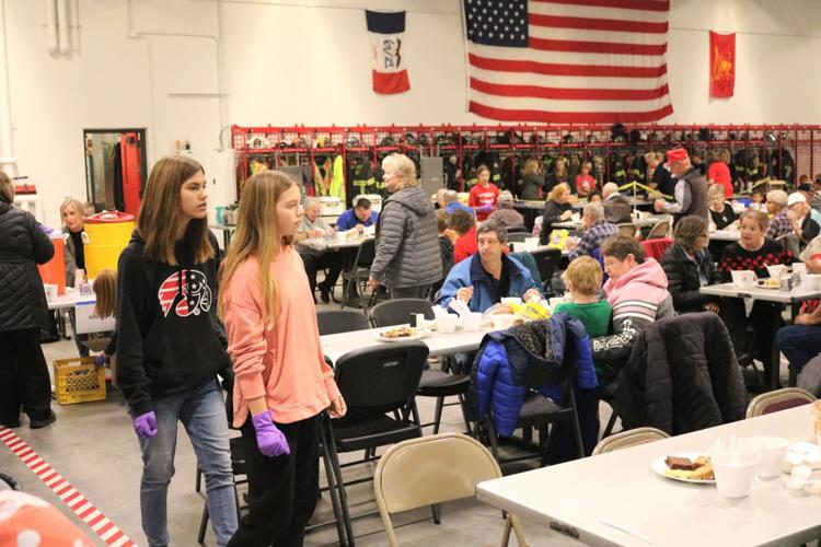 Young volunteers help serve guests at a soup supper fundraiser on Nov. 13 in Forest City..JPG
