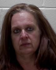 Manly woman accused of slashing tires charged with OWI, drugs