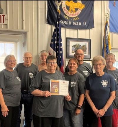 From left are Dean Welsh VFW Post 4370 members Marsha and Raymond Wenthold, Jean Perkins, Judy Sonius, Cynthie and Mike Madson, Blanche Chizek, and Nancy Michel..jpg