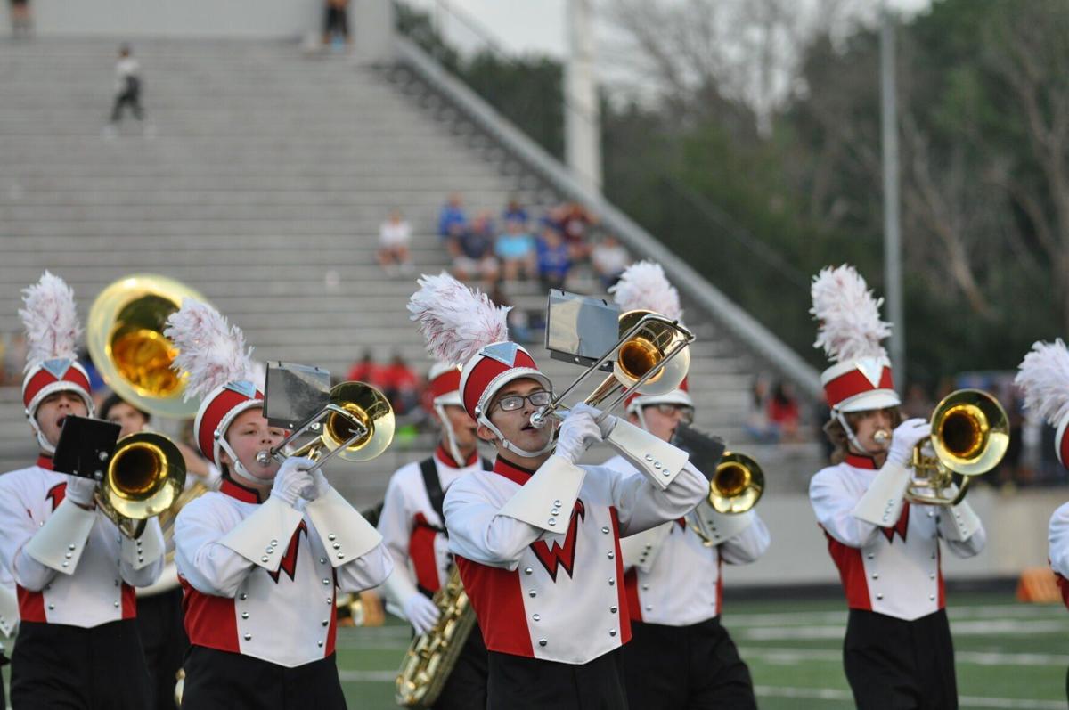 Photos: Davenport Assumption marching band performs at halftime of football  game (Oct. 20, 2022)