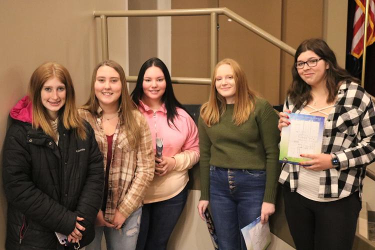 First-year career center students of Forest City, Garner-Hayfield-Ventura, and North Iowa greeted guests at handed out programs at the center's grand opening program..JPG