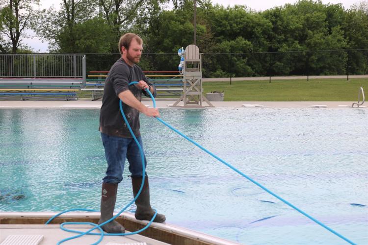 Brett Geelan cleans pool