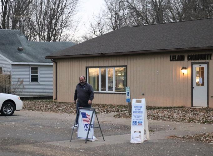 A Winnebago County voter exits the polls at the Forest-Newton Precinct in Leland..JPG