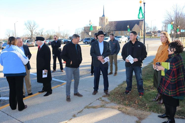 At center are Winnebago County Board of Supervisors Chair Terry Durby, Sentator Dennis Guth, and Representative Henry Stone..JPG