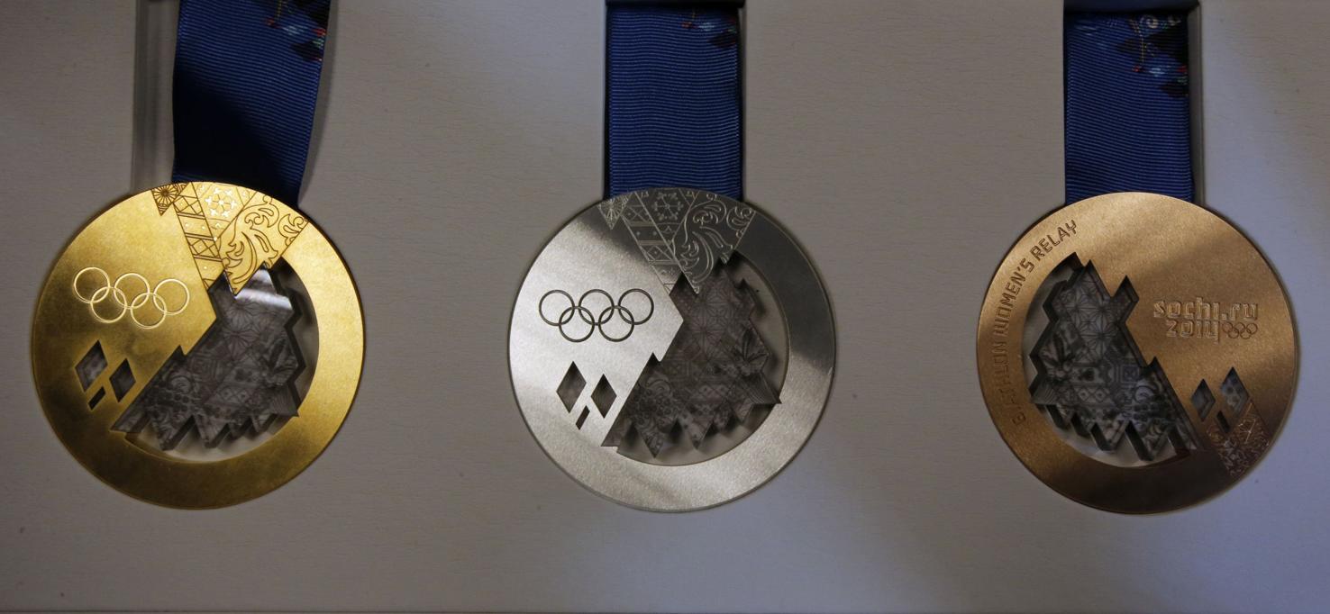 Here's a look at every Olympic gold medal design since 2000 Olympics