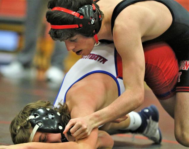 Mason City experiences close dual, comes out on top over Bobcats