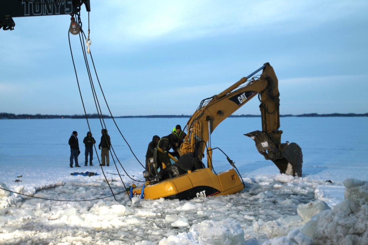 Update No one hurt after excavator breaks through ice on Clear Lake
