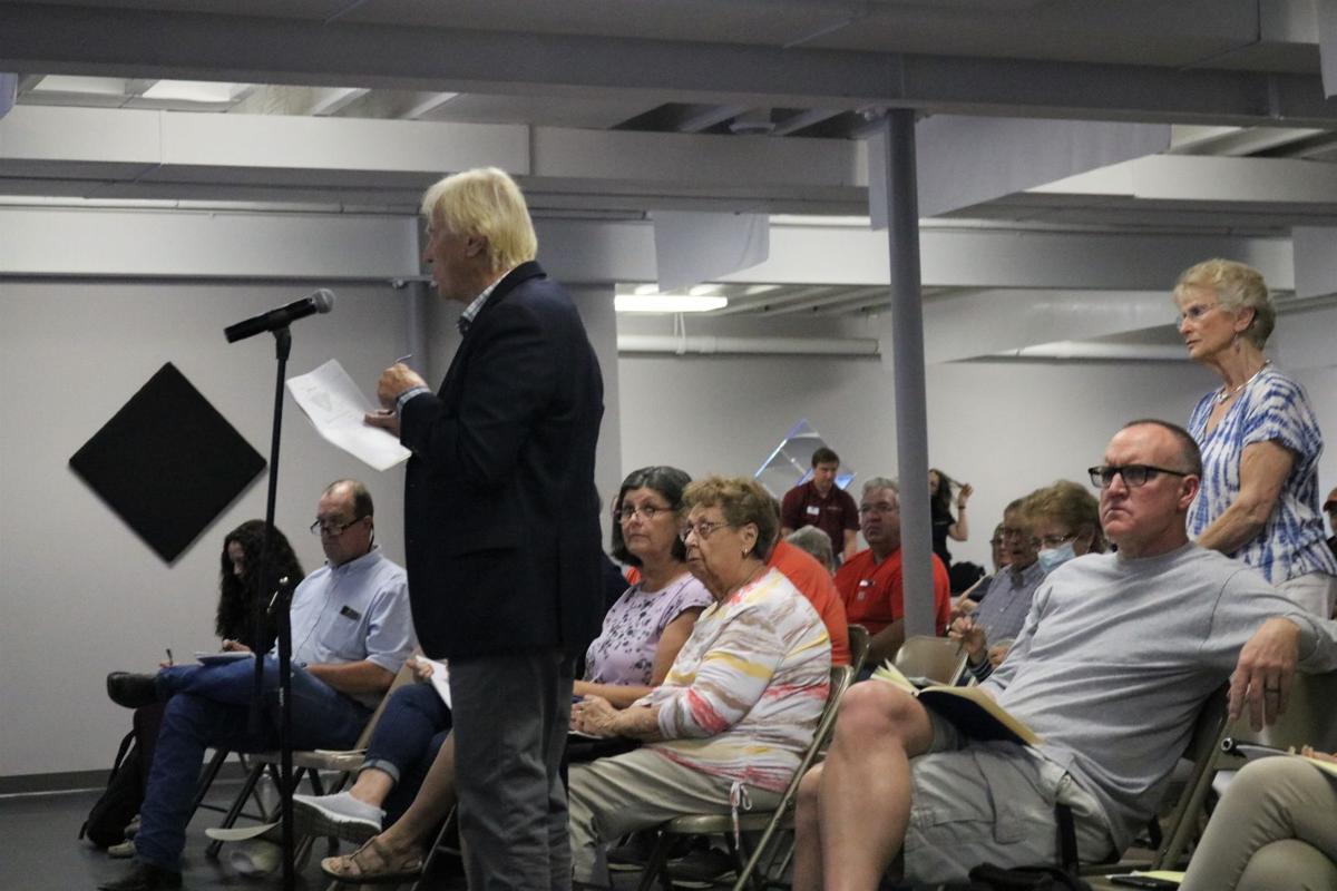 Dennis Schwab questions pipeline company officials at a meeting in Garner on Sept. 28.JPG
