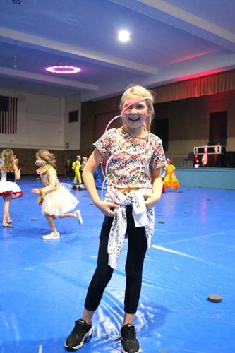 Aspyn Giesen, 9, was eager to display her Halloween costume and glow sticks attire at the Forest City Parks and Rec Elementary Halloween Party..JPG