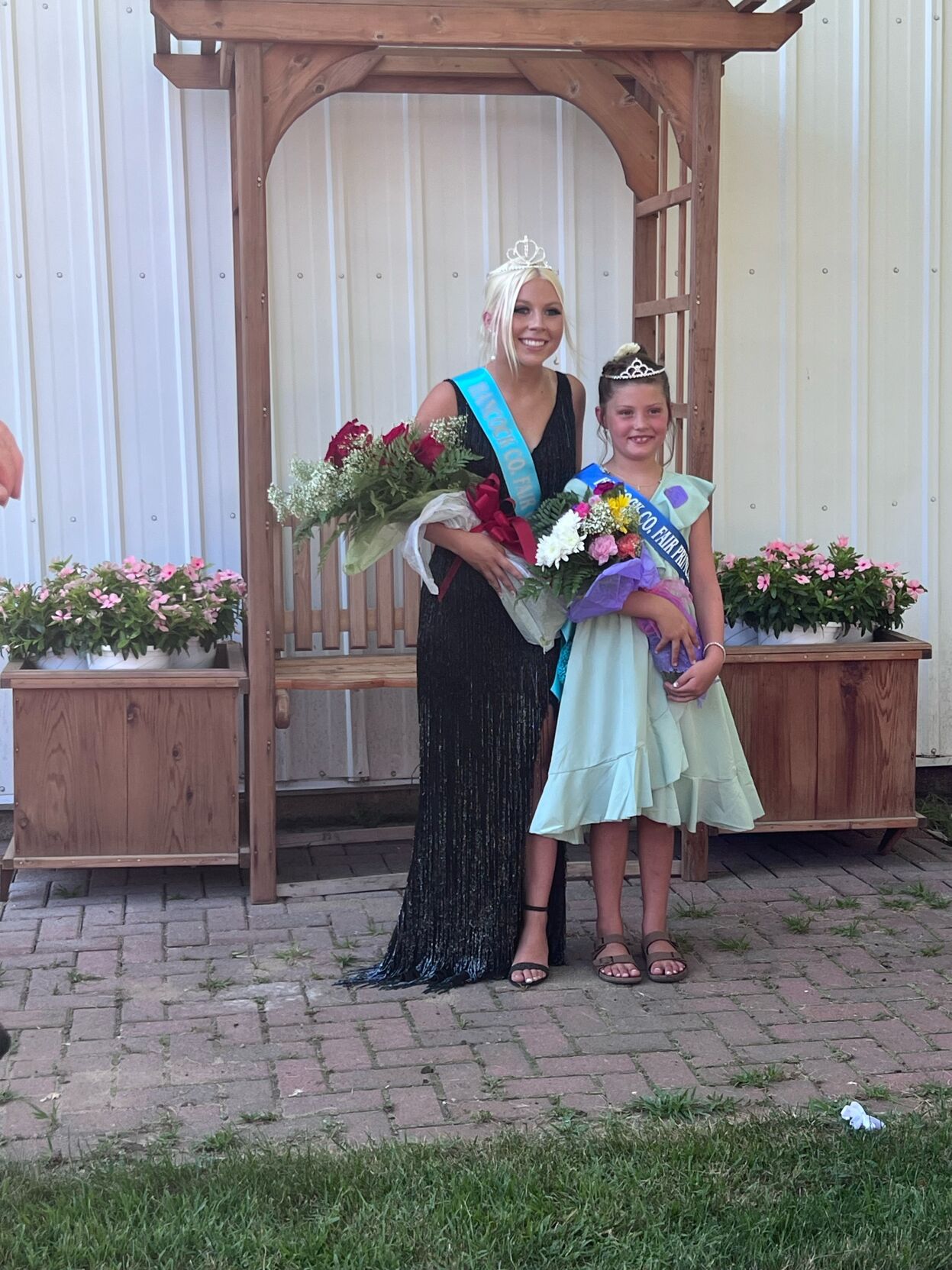 Newly crowned Fair Queen Sydney Tue and Fair Princess Ivy Ostercamp are pictured at the 2023 Hancock County District Fair in Britt..jpeg