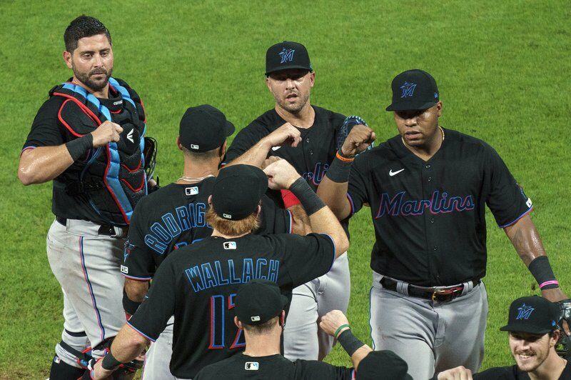 MLB temporarily suspends Marlins season through the weekend