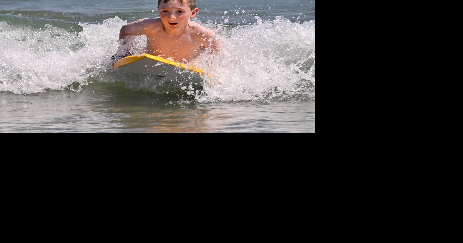Heat brings beach goers: Reservations required after Memorial Day