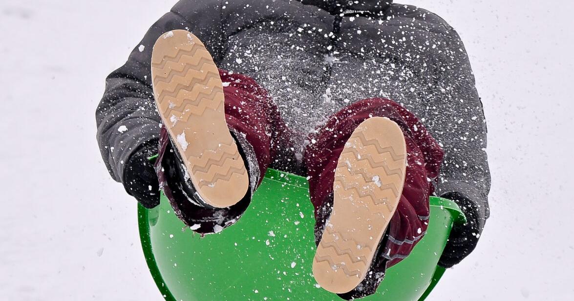 Saucering over snow as school vacation week starts