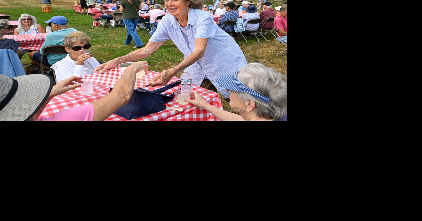 Picnic on the shore: Seniors treated to burgers at Stage Fort Park