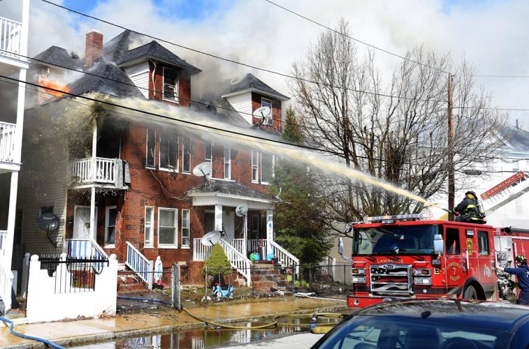 Three-alarm house fire displaces families in Lawrence | North Of Boston ...