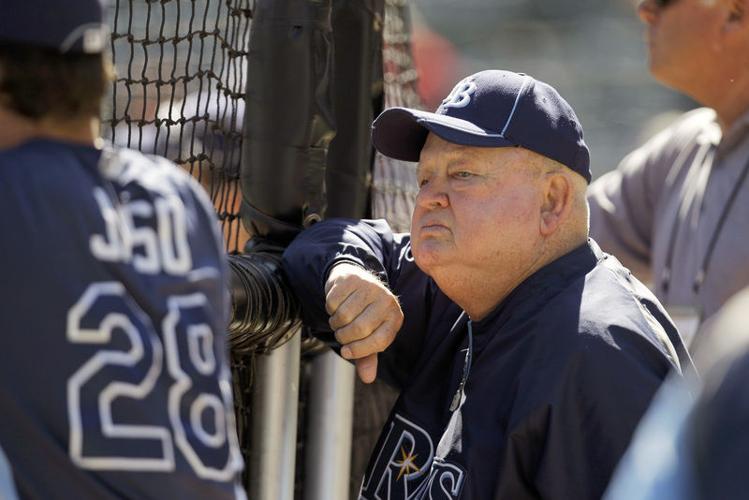 New York Yankees bench coach Don Zimmer wearing military helmet