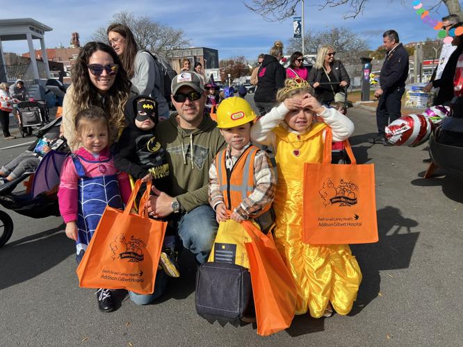 Tots trick-or-treat on Harbor Loop and Main Street | News ...