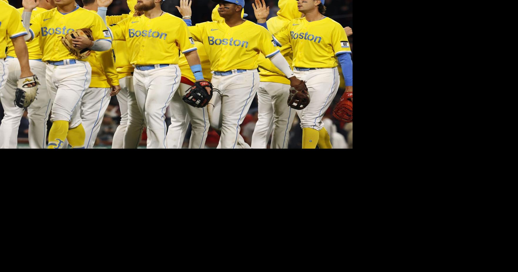 Why do the Red Sox wear yellow jerseys?