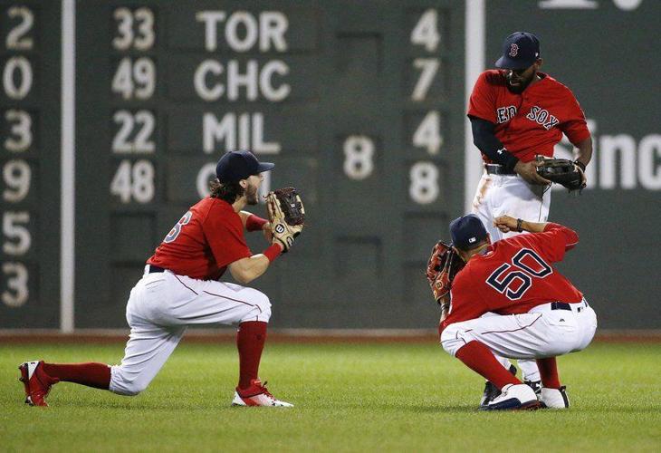 Yankees' Judge knocks open bullpen door while making running catch