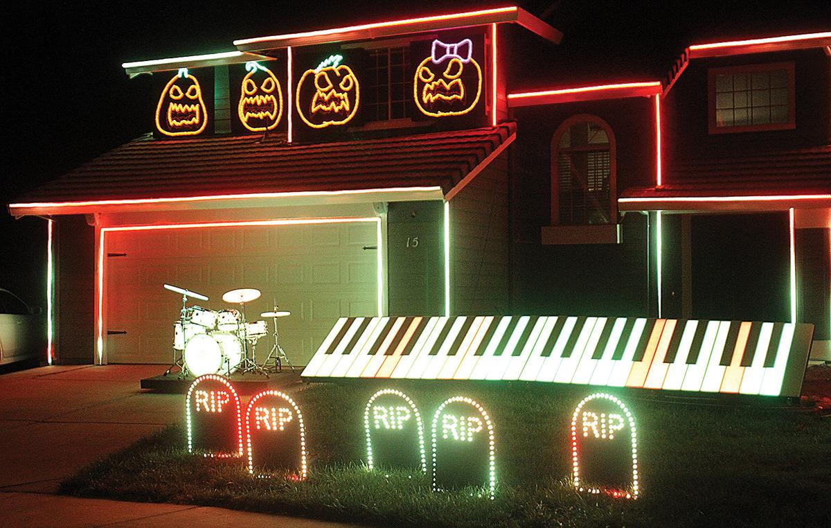 Halloween light show Tracy Press