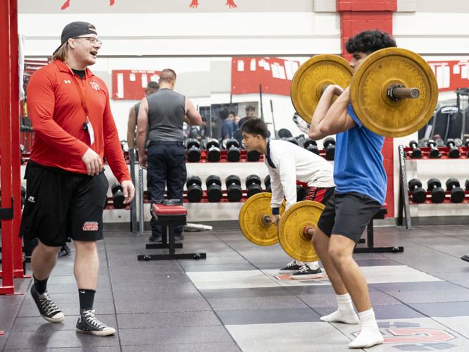 Strength & Conditioning Grim working to help students reach athletic