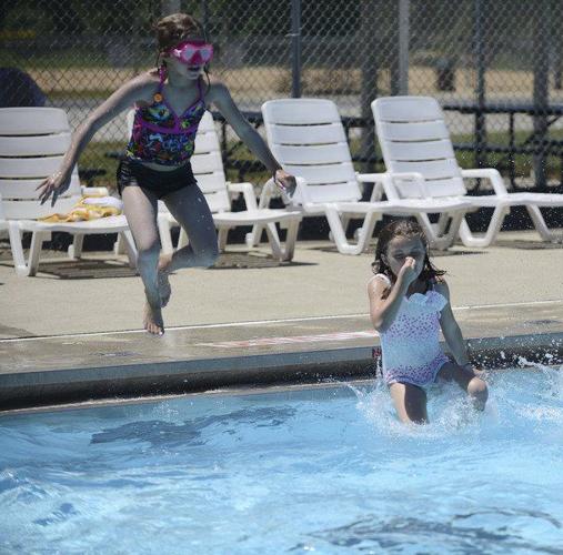 A COOL DUNK Children,adults enjoying Shanklin Pool Lifestyles