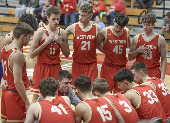 PREP BOYS BASKETBALL Goshen goes to the basket, holds off Westview for