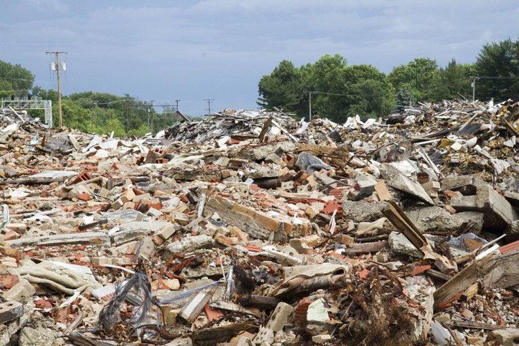 City threatens legal action against owners of former Johnson Controls