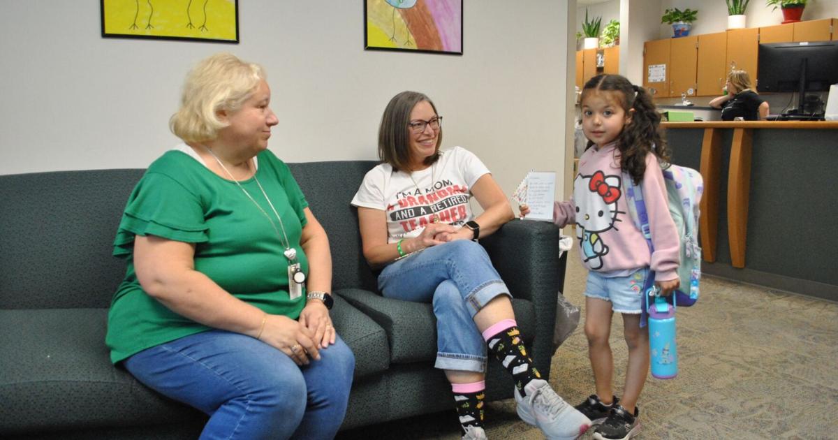 LAST BELL: Model's Bontrager & Miller wave goodbye on last day of school