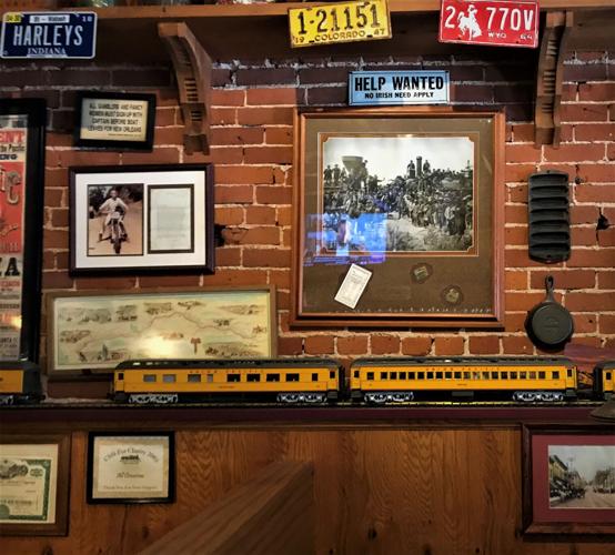 A miniature Lionel train is just one of the collecter items adorning shelves at the Market Street Grill.JPG