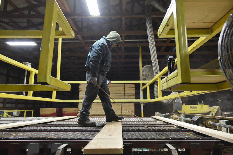 lumber indiana hardwood wible line mill industry hardwoods depth goshennews yant sorting planks colton inspects worker across roll south afternoon