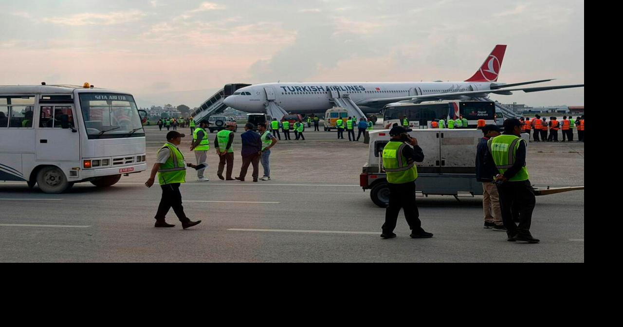 Turkish Airlines passengers slide to safety after jet catches fire in Kathmandu