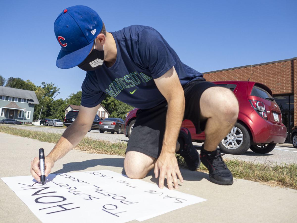 Group rallies at Goshen post office in support of postal workers News
