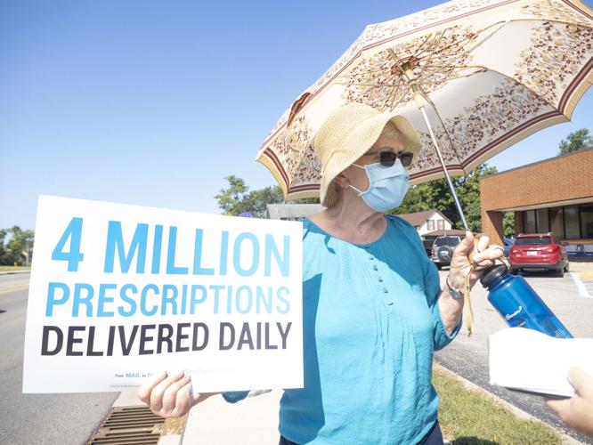 Group rallies at Goshen post office in support of postal workers News