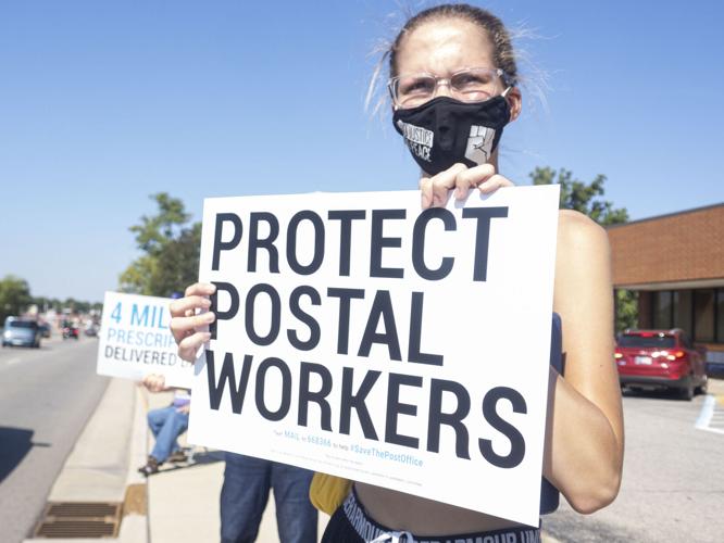 Group rallies at Goshen post office in support of postal workers News