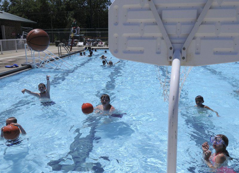 A COOL DUNK Children,adults enjoying Shanklin Pool Lifestyles